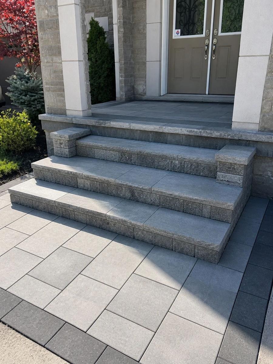 Natural-stone front entrance steps leading to the door